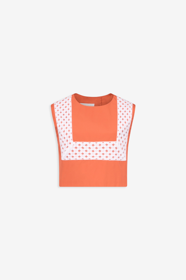 Top sans manches orange avec ruban contrasté