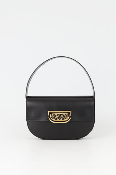 Black leather handbag with golden latch