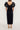 Black velvet structured puff sleeve midi dress