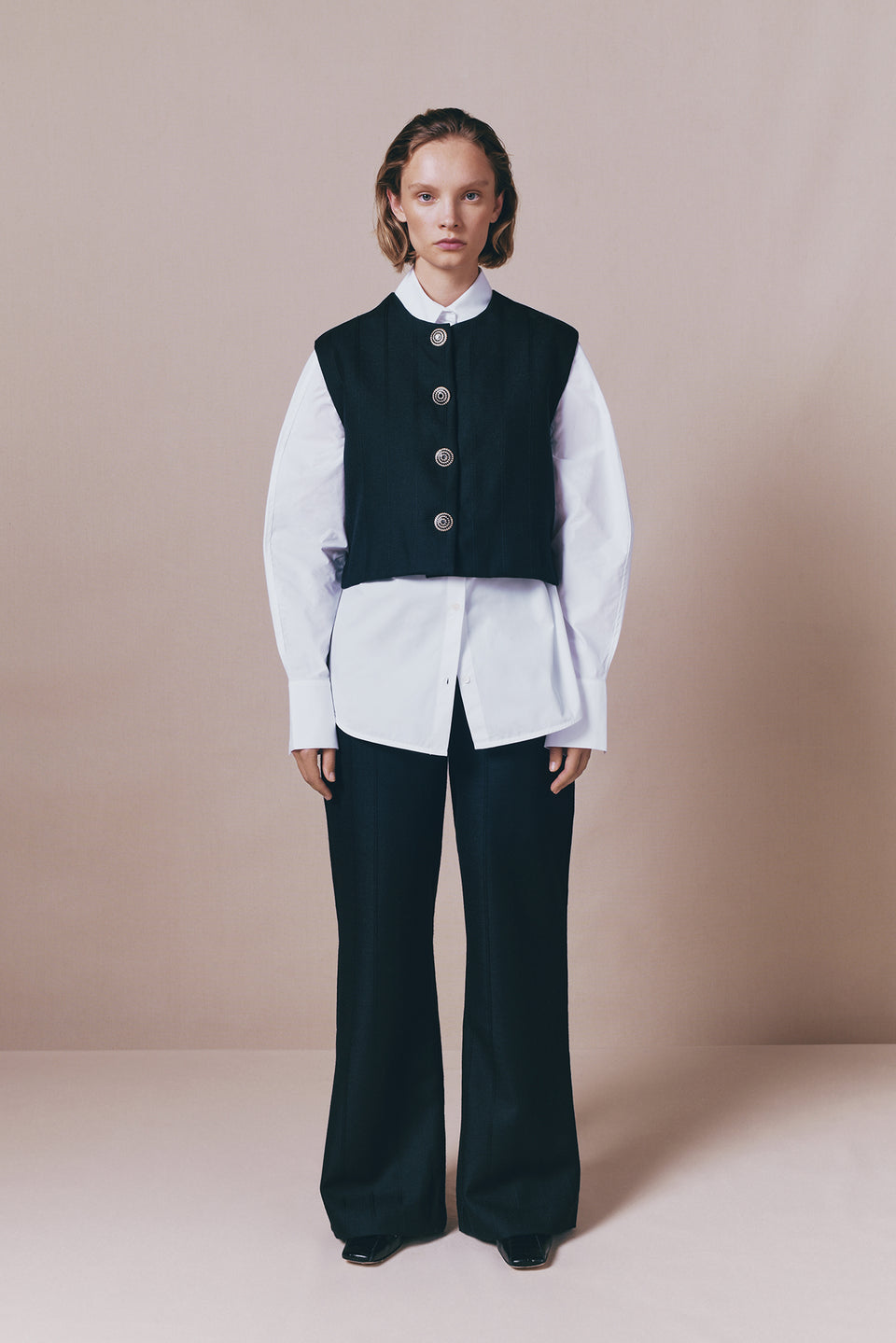 Black buttoned virgin wool sleeveless vest