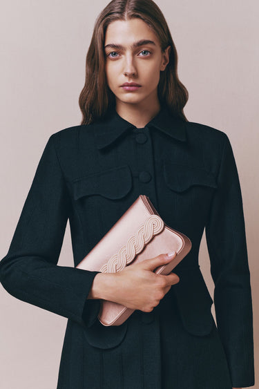 Blush satin clutch with braided passementerie