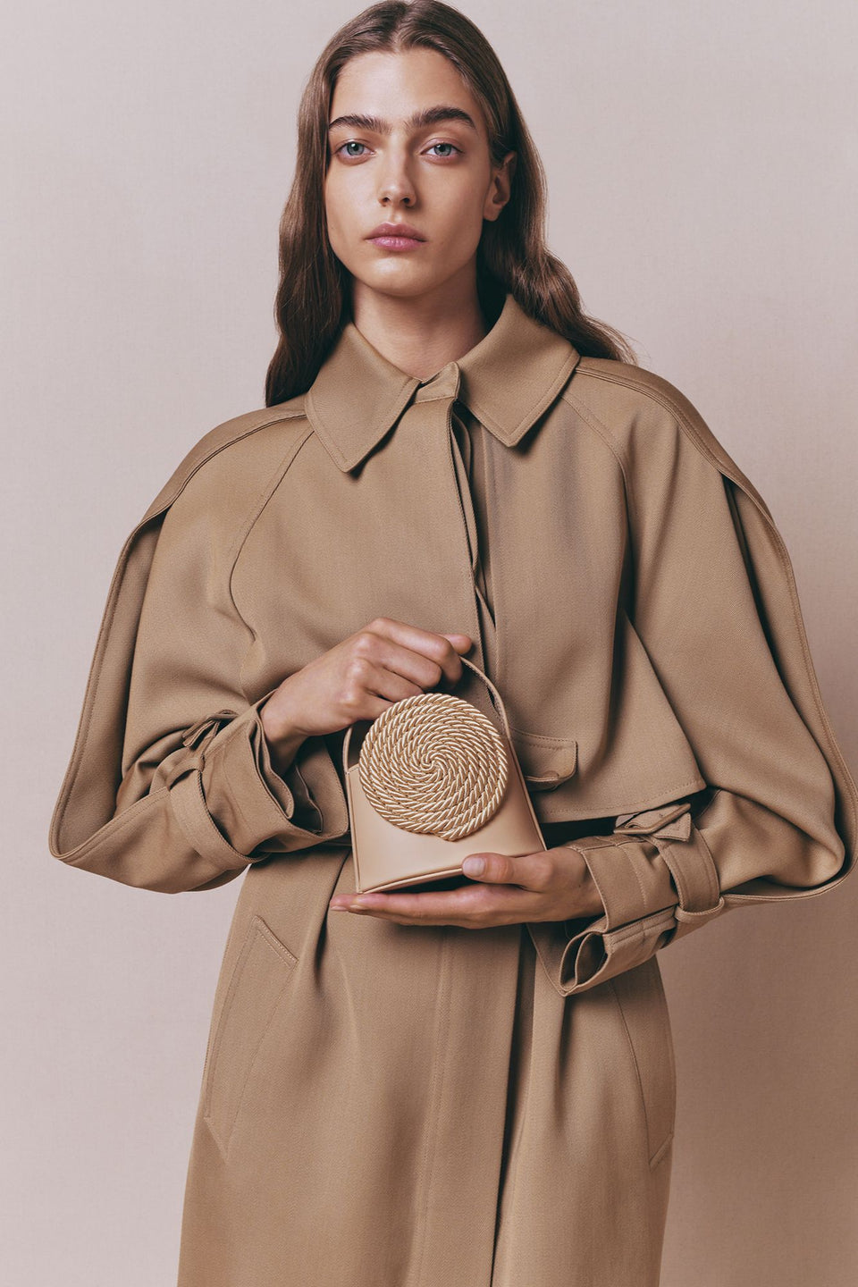 Beige leather mini bag with passementerie details – DESTREE 